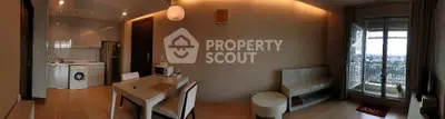 Modern apartment interior with open kitchen and balcony view