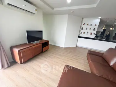 Modern living room with sleek furniture and open layout