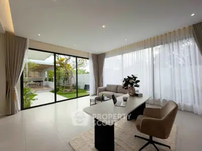 Spacious modern living room with garden view and elegant decor