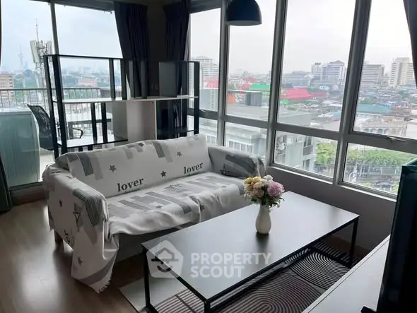 Modern living room with panoramic city view and stylish decor