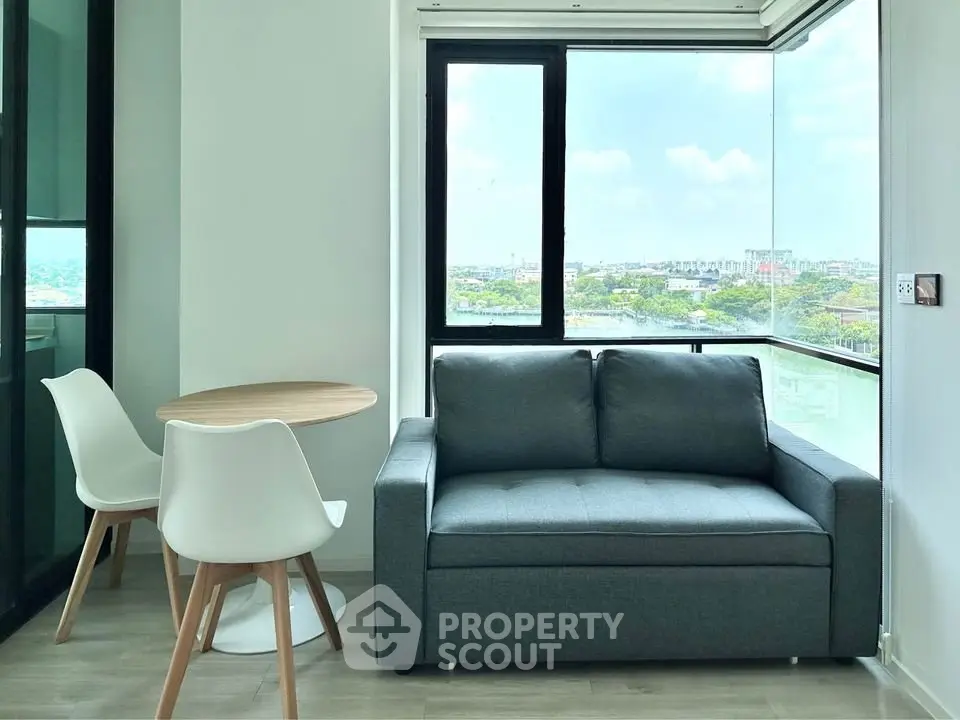 Modern living room with panoramic city view and stylish furniture