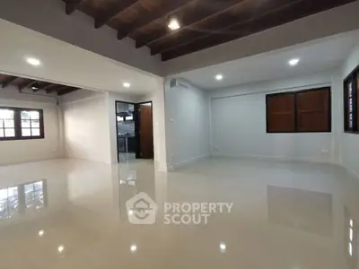 Spacious open-plan living area with modern finishes and natural light