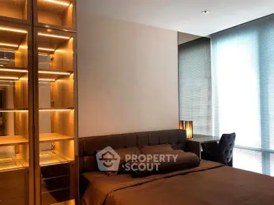 Luxurious bedroom with elegant lighting and modern furnishings