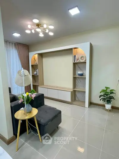 Modern living room with elegant shelving and stylish lighting