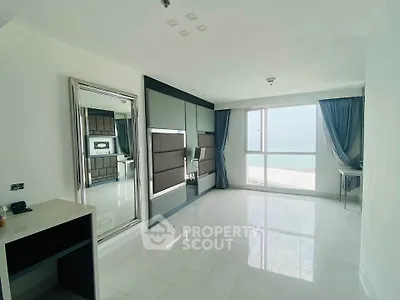 Spacious living room with ocean view and modern decor
