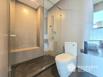 Modern bathroom with glass shower and sleek design