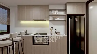 Modern kitchen with sleek cabinetry and built-in appliances