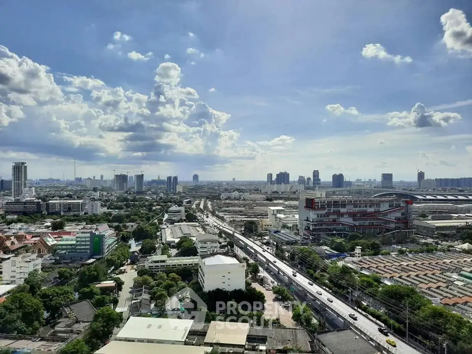 Stunning cityscape view from high-rise building showcasing urban skyline and vibrant city life.