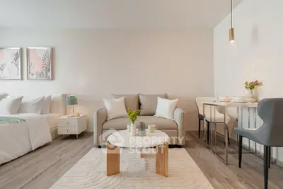 Modern studio apartment with cozy living area and stylish decor