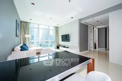 Spacious modern living room with city view and elegant decor