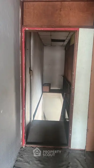 Explore potential in this fixer-upper with unique architectural features and ample renovation opportunities.