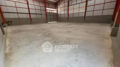 Spacious industrial warehouse with high ceilings and ample storage space