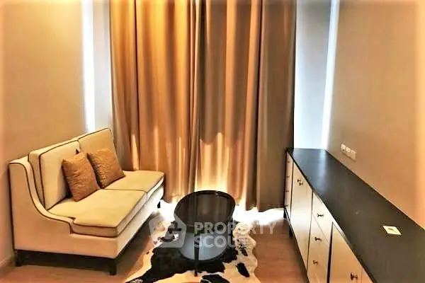 Cozy small living room with elegant sofa and stylish decor