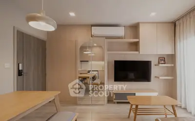 Modern living room with stylish wooden furniture and wall-mounted TV