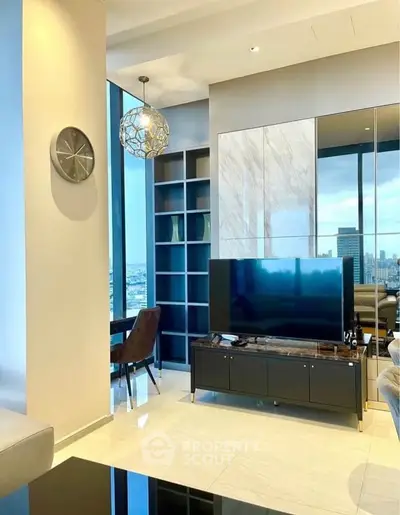 Luxurious modern living room with city view, elegant decor, and stylish furniture.