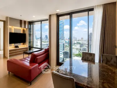 Luxurious living room with stunning city view and modern furnishings