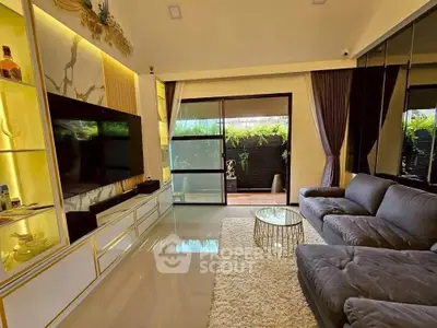 Luxurious living room with modern decor and garden view, featuring plush sofa and elegant entertainment unit.