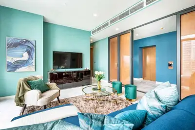 Luxurious modern living room with stylish decor and vibrant colors