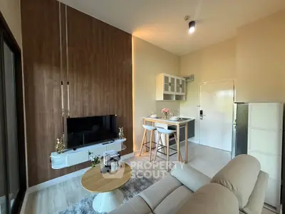 Modern living room with stylish decor and open kitchen layout