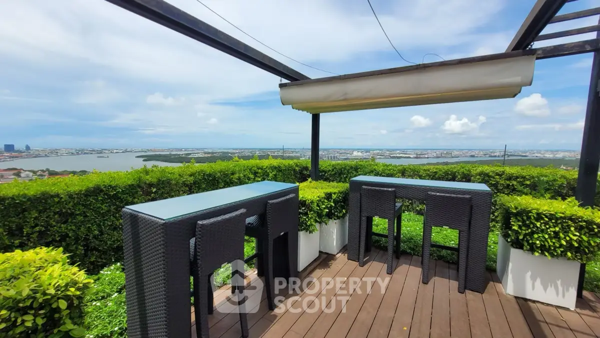Stunning rooftop terrace with panoramic city and river views, perfect for entertaining.