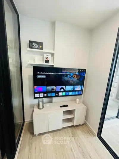 Modern living room with sleek TV setup and stylish decor