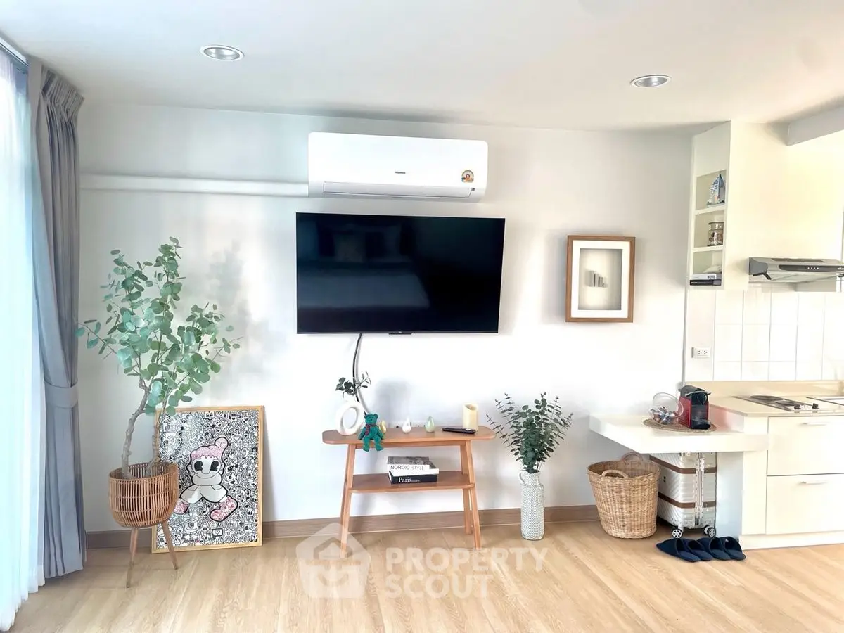 Stylish modern living room with wall-mounted TV and elegant decor
