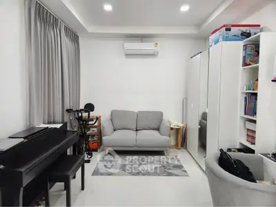 Cozy living room with piano and modern decor