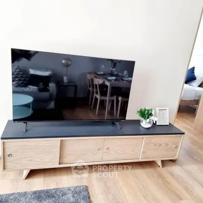 Modern living room with sleek TV stand and stylish decor