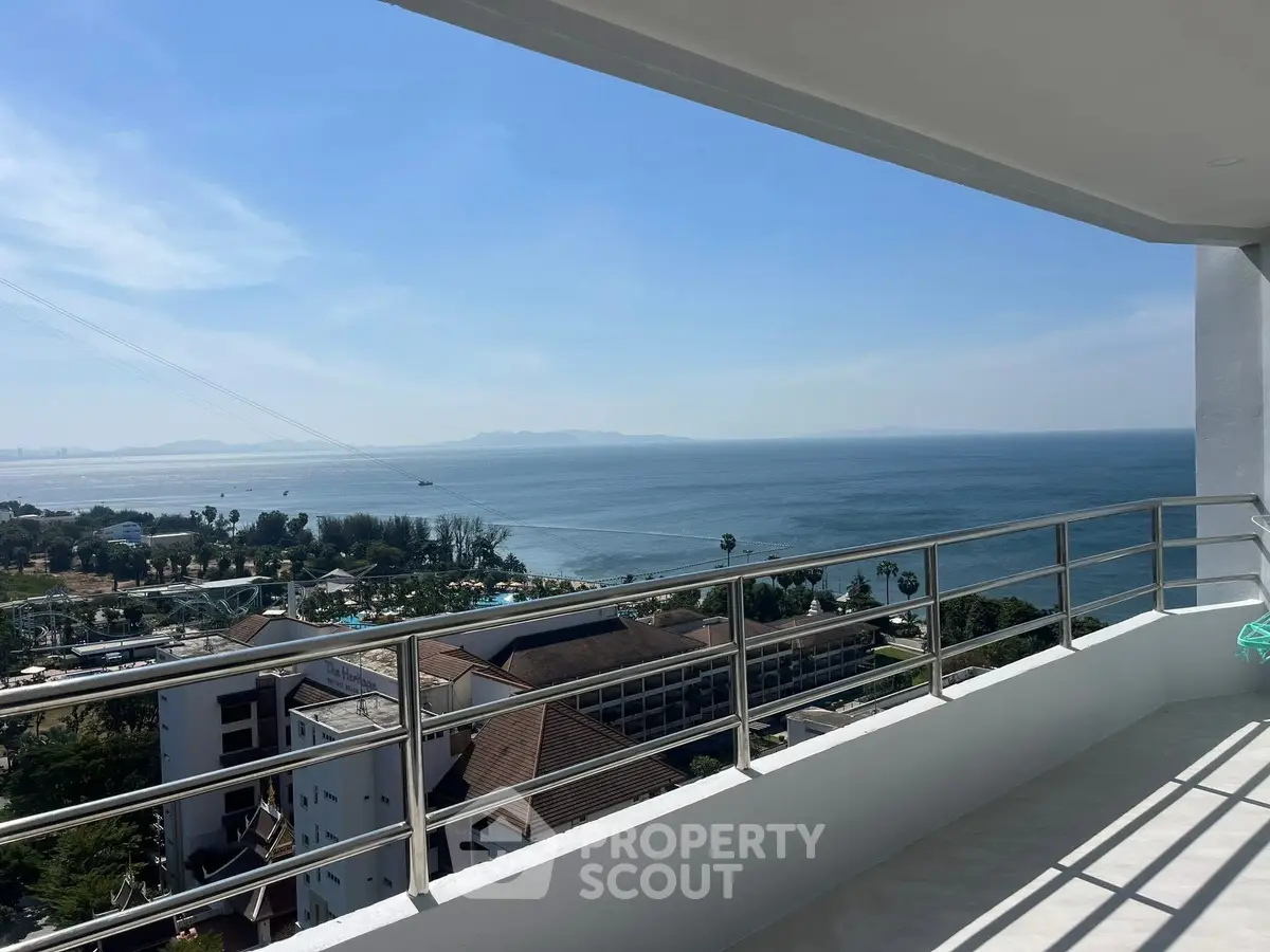 Stunning ocean view from a spacious balcony in a luxury property.