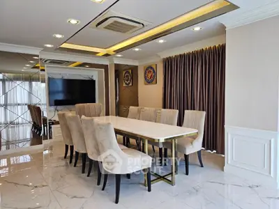 Luxurious dining room with elegant marble flooring and plush seating