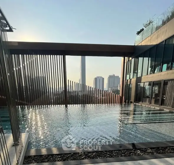 Luxurious rooftop infinity pool with stunning city skyline view