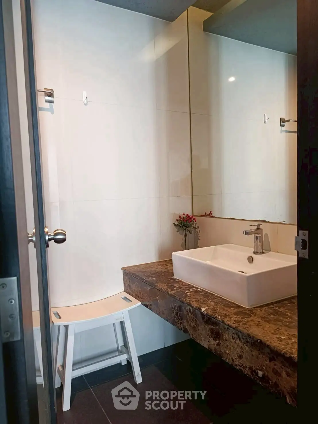 Modern bathroom with sleek sink and marble countertop