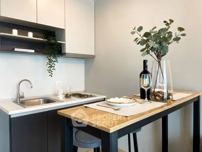 Modern kitchen with sleek design and stylish dining area