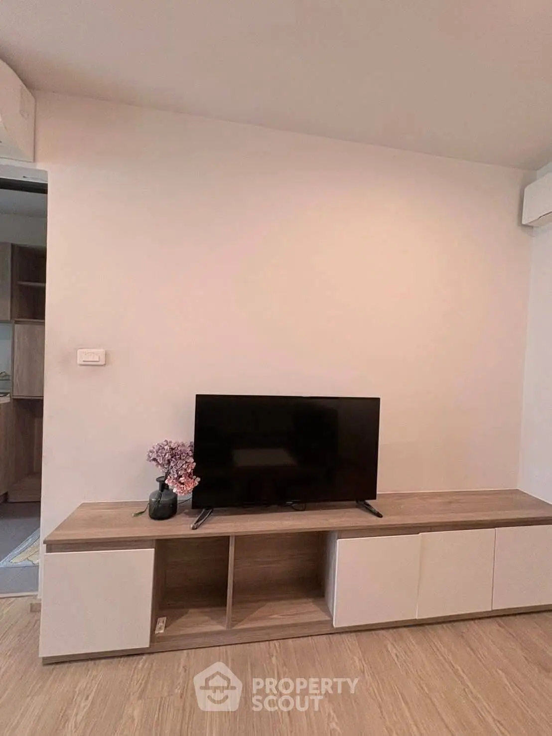 Modern living room with sleek TV stand and minimalist decor