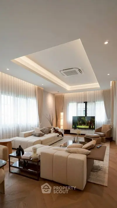 Luxurious modern living room with elegant decor and ample natural light