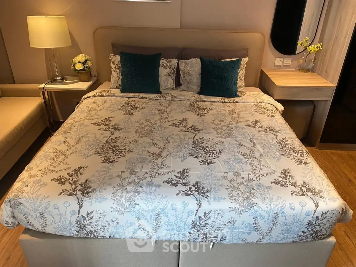 Luxurious bedroom with elegant bedding and stylish decor, perfect for a cozy retreat.