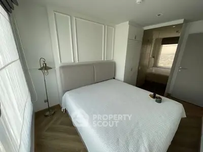 Modern bedroom with elegant decor and natural light