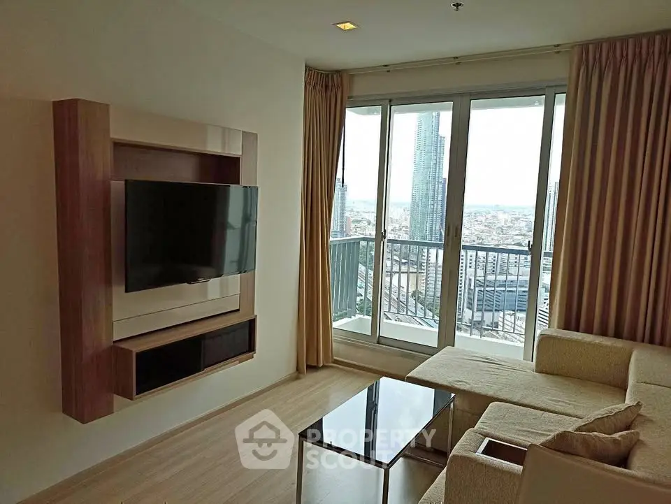 Modern living room with balcony view in high-rise apartment