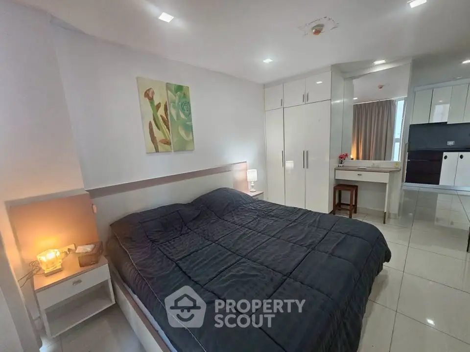 Modern bedroom with sleek design and cozy ambiance