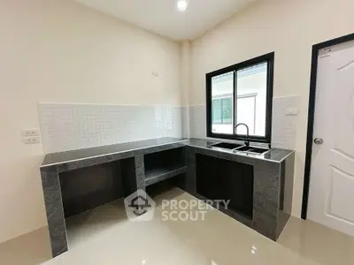 Modern kitchen with sleek countertops and open layout design