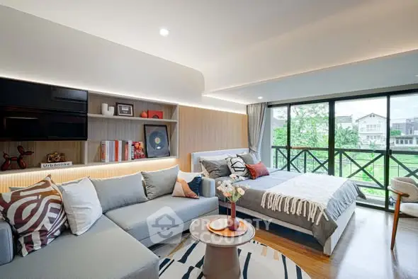 Modern living room with large windows and stylish decor