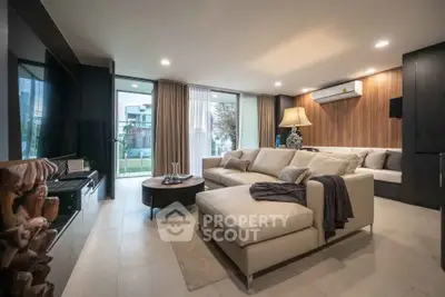 Luxurious modern living room with elegant decor and spacious seating area