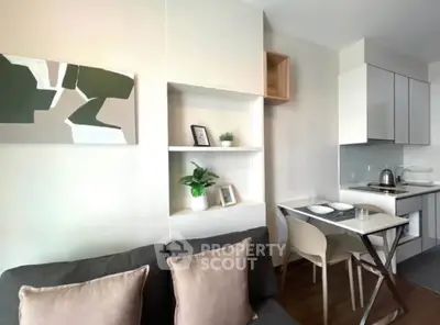 Modern compact living room with integrated kitchen and stylish decor