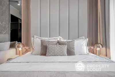 Luxurious modern bedroom with elegant decor and plush bedding