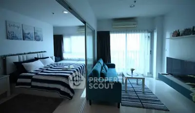 Modern studio apartment with stylish decor and ample natural light.