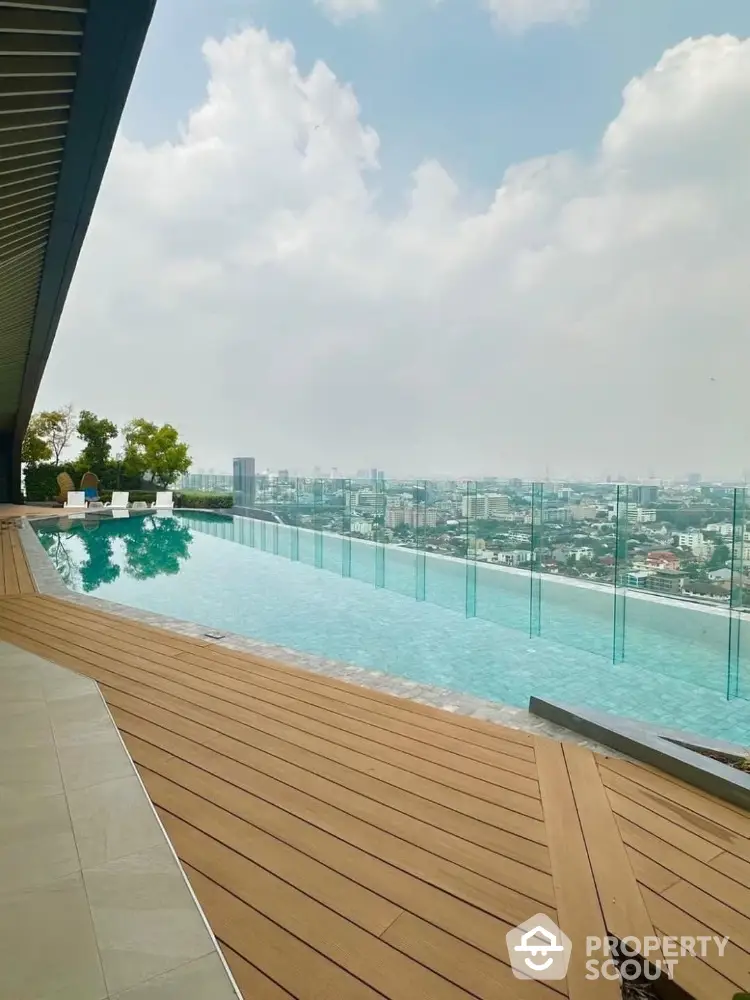 Luxurious rooftop infinity pool with stunning city skyline view