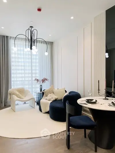 Stylish modern living room with elegant furniture and chic lighting in a luxury apartment.