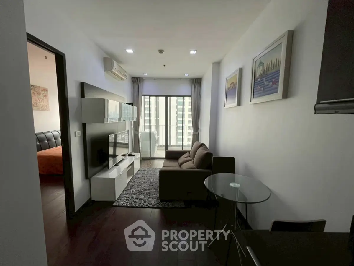 Modern living room with balcony view in stylish apartment