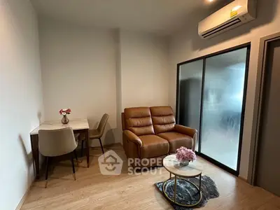 Cozy living room with modern furniture and air conditioning