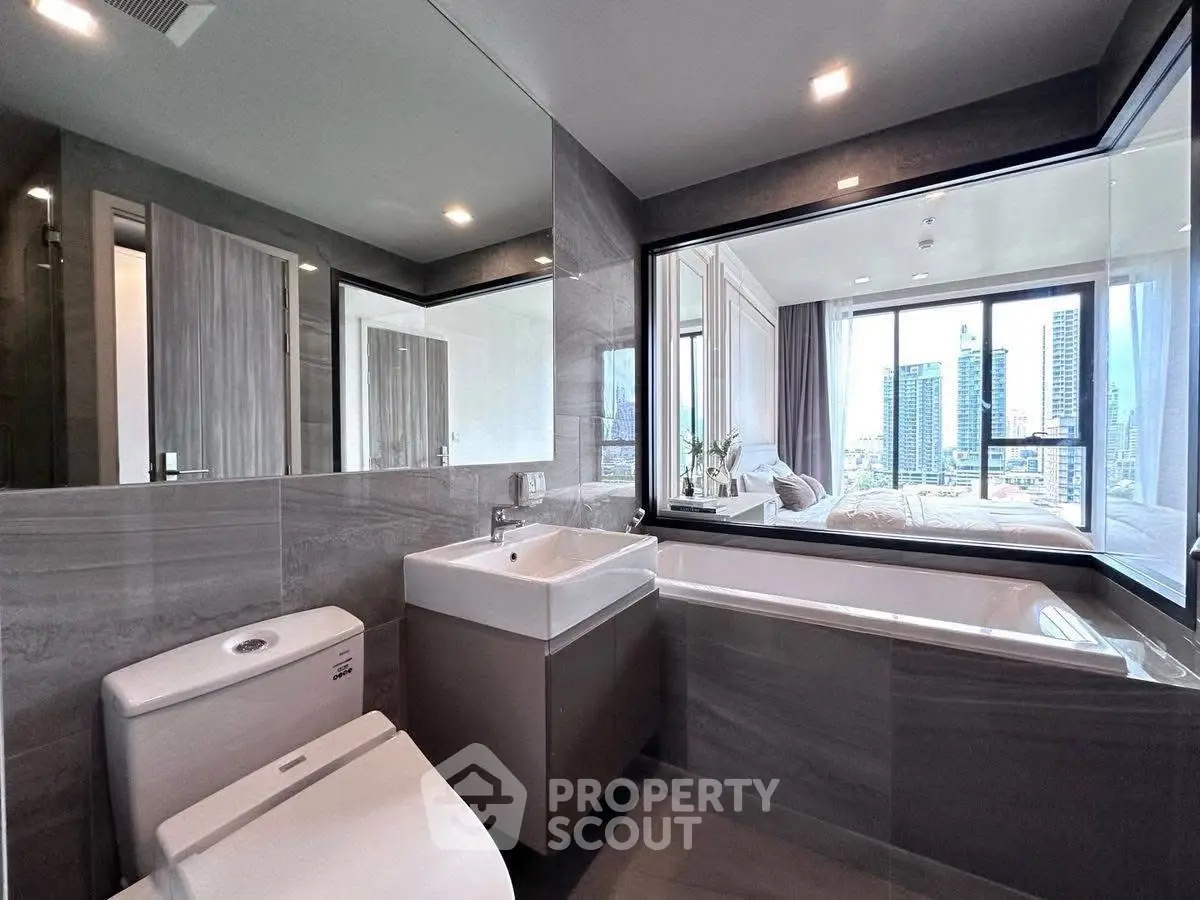 Luxurious modern bathroom with city view and sleek design